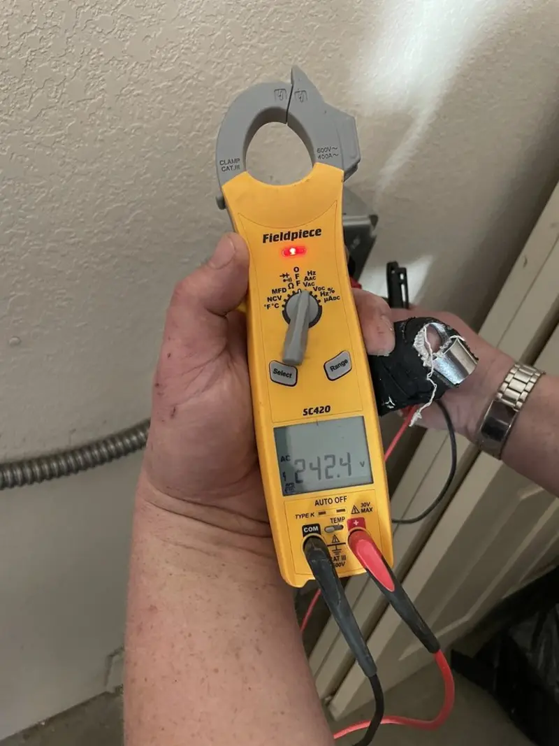 Voltage testing with clamp meter during Hot Tub / Pool Electrical Wiring in Superior